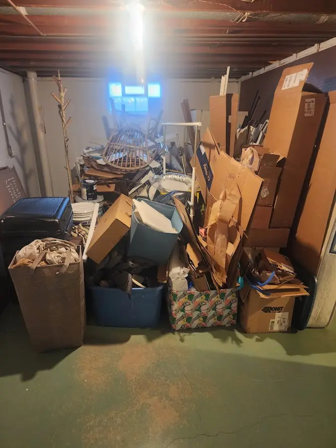 Roll-off dumpster container at job site for Construction Dumpster Rental in Oxford